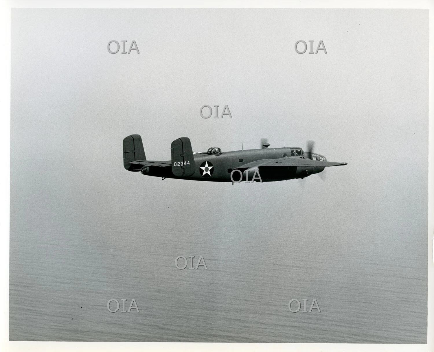 North American B-25 Mitchell Medium Bomber (Serial 02344), Rear Three-Quarter View Over Water