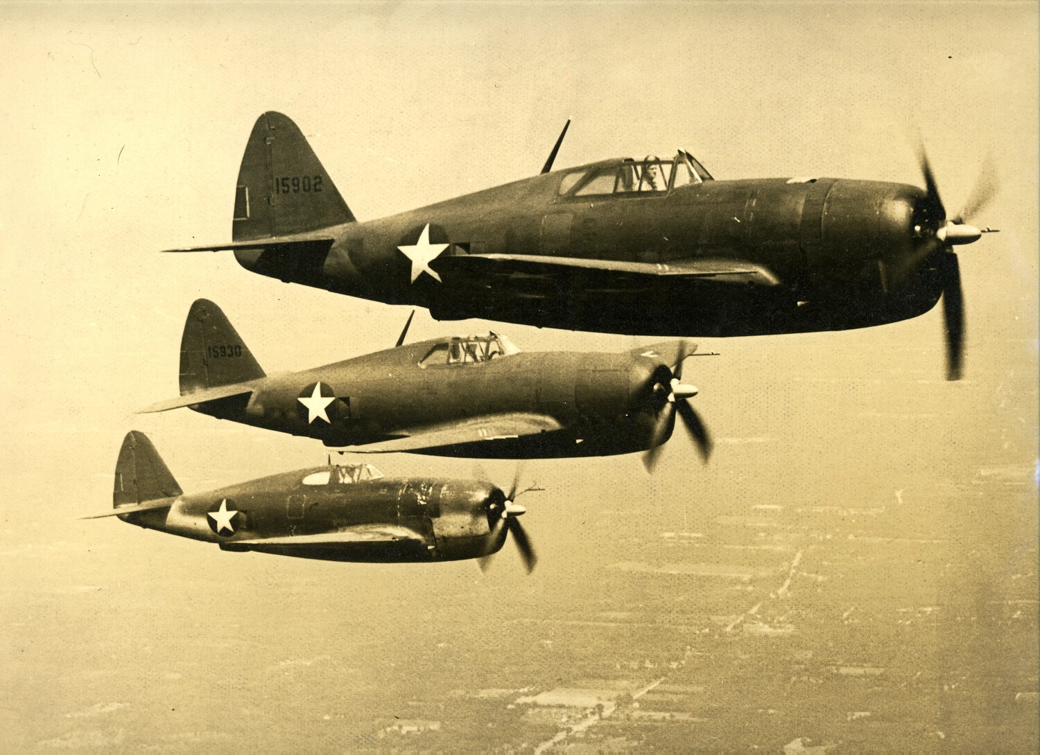 Three Republic P-47 Thunderbolt Fighters in Formation Flight, World War II