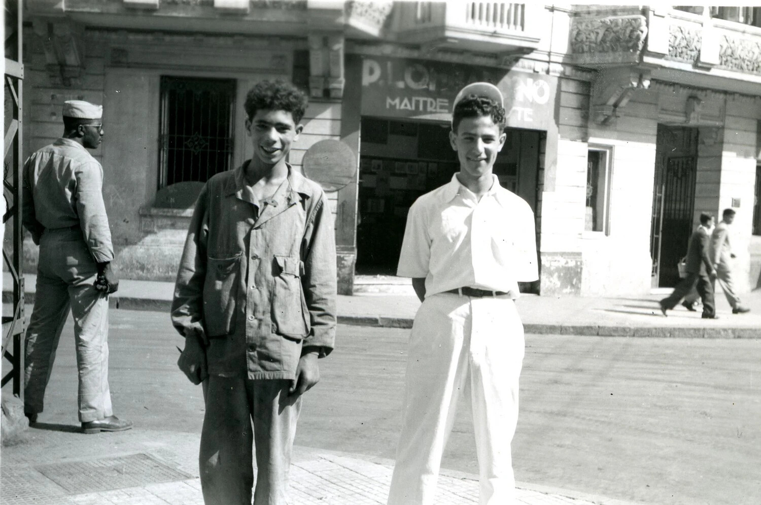 Two Local Young Men Posing on Street Corner, French North African City, World War II Era