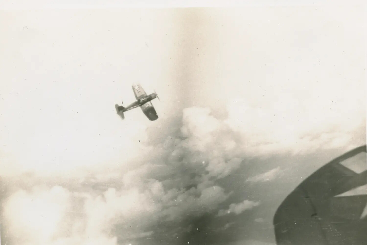 Air-to-Air Photograph of U.S. Navy Fighter in Flight, WWII Pacific Theater