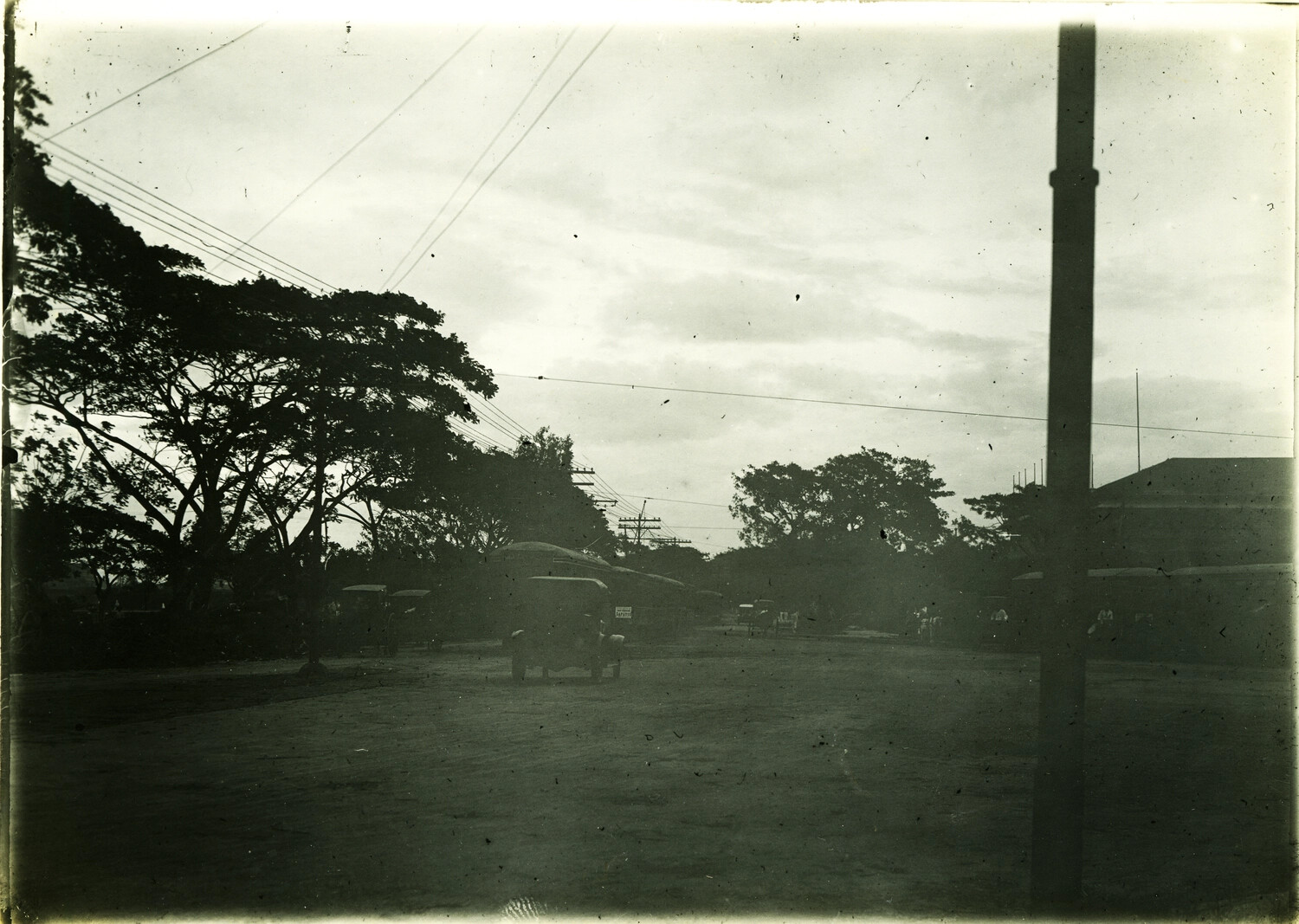 Street Scene with Carriages and Smokestack, Philippines, Early 1900s