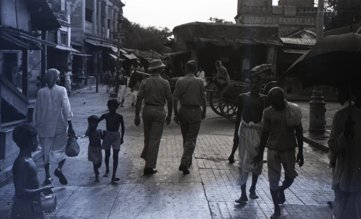 Allied Servicemen Walking Through Indian Market Street, CBI Theater, WWII