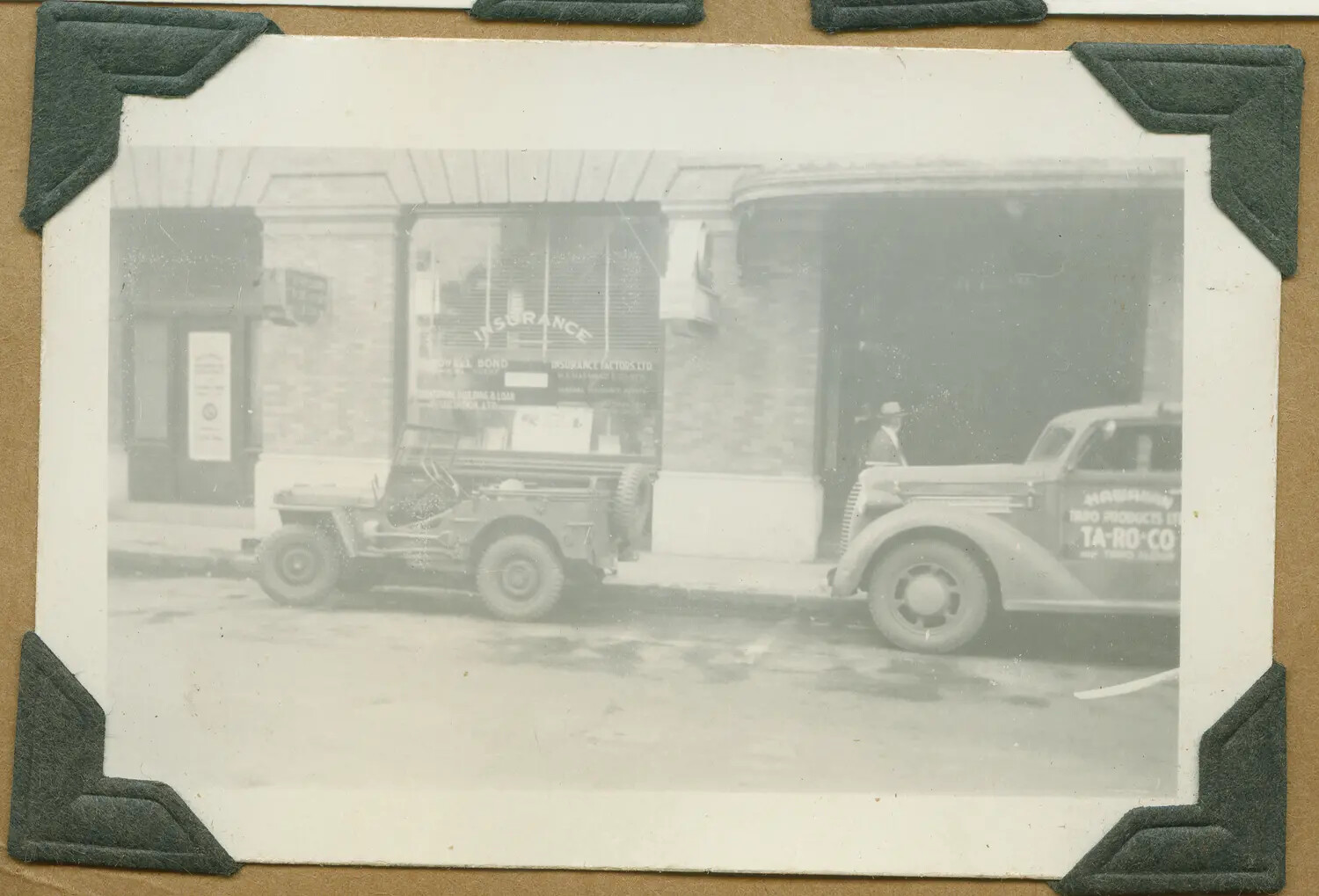 Jeep and Delivery Truck on Honolulu Street, Hawaii, World War II Era