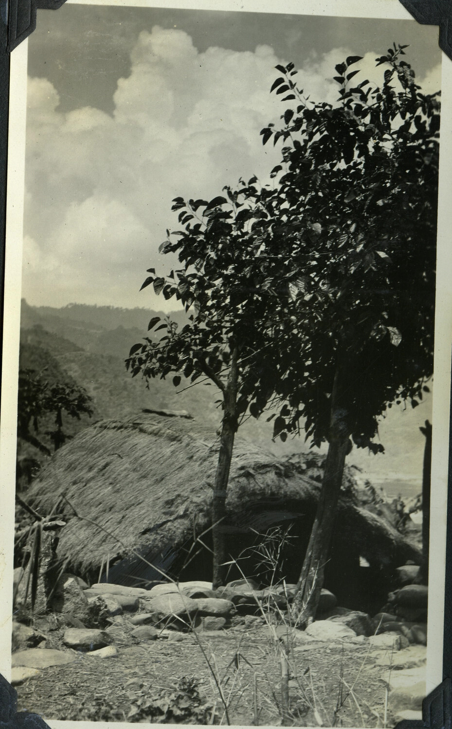 Thatched-Roof Nipa Huts in a Philippine Hillside Village, Luzon Province