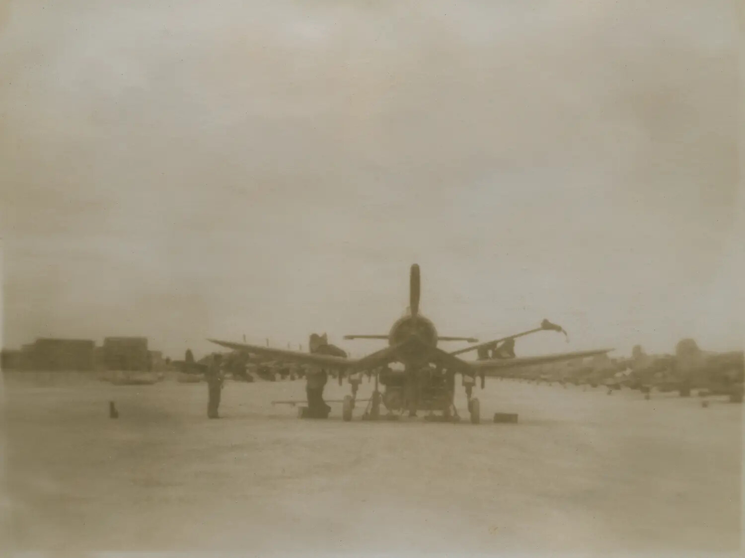 Ground Crew Servicing Single-Engine Radial Fighter/Attack Aircraft, WWII Pacific Airfield -- Pat McAleer Collection