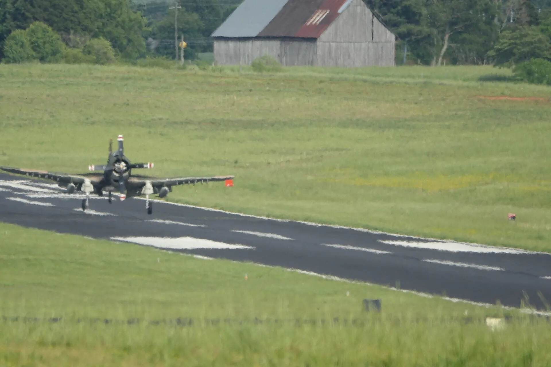 Douglas A-1 Skyraider on Short Final, Moments Before Touchdown