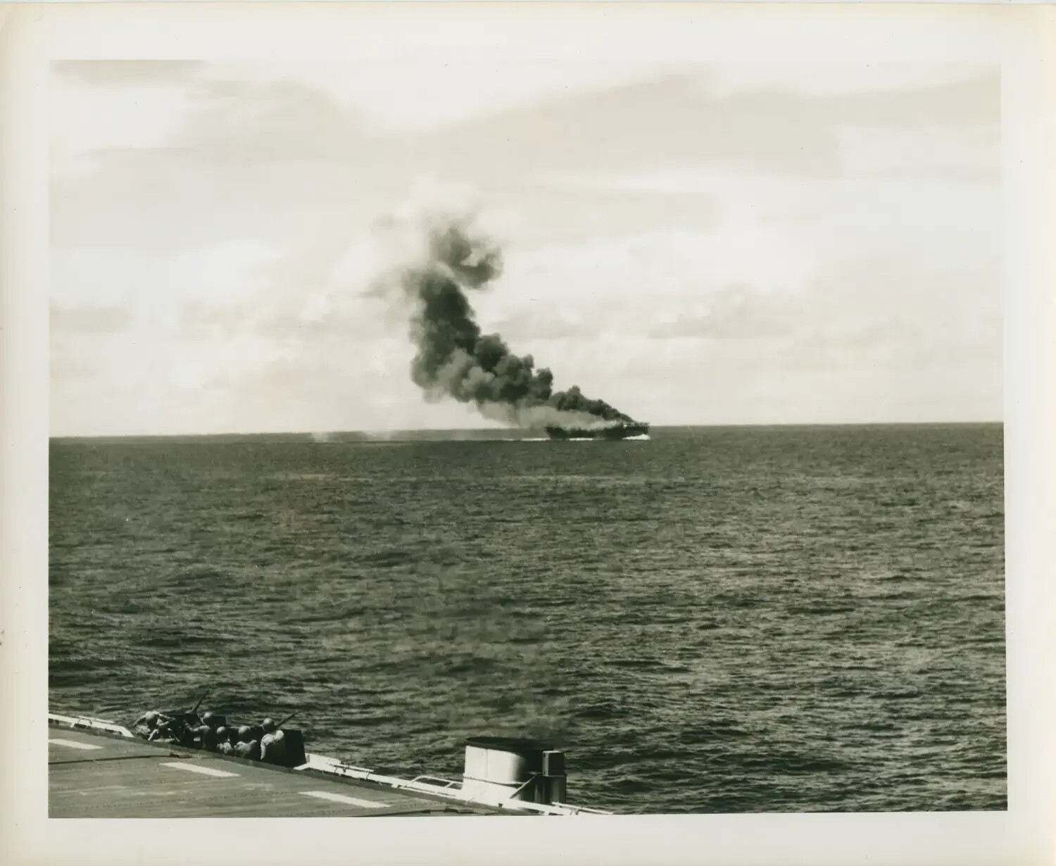 Burning Ship Viewed from Flight Deck of USS Petrof Bay (CVE-80), WWII Pacific Theater