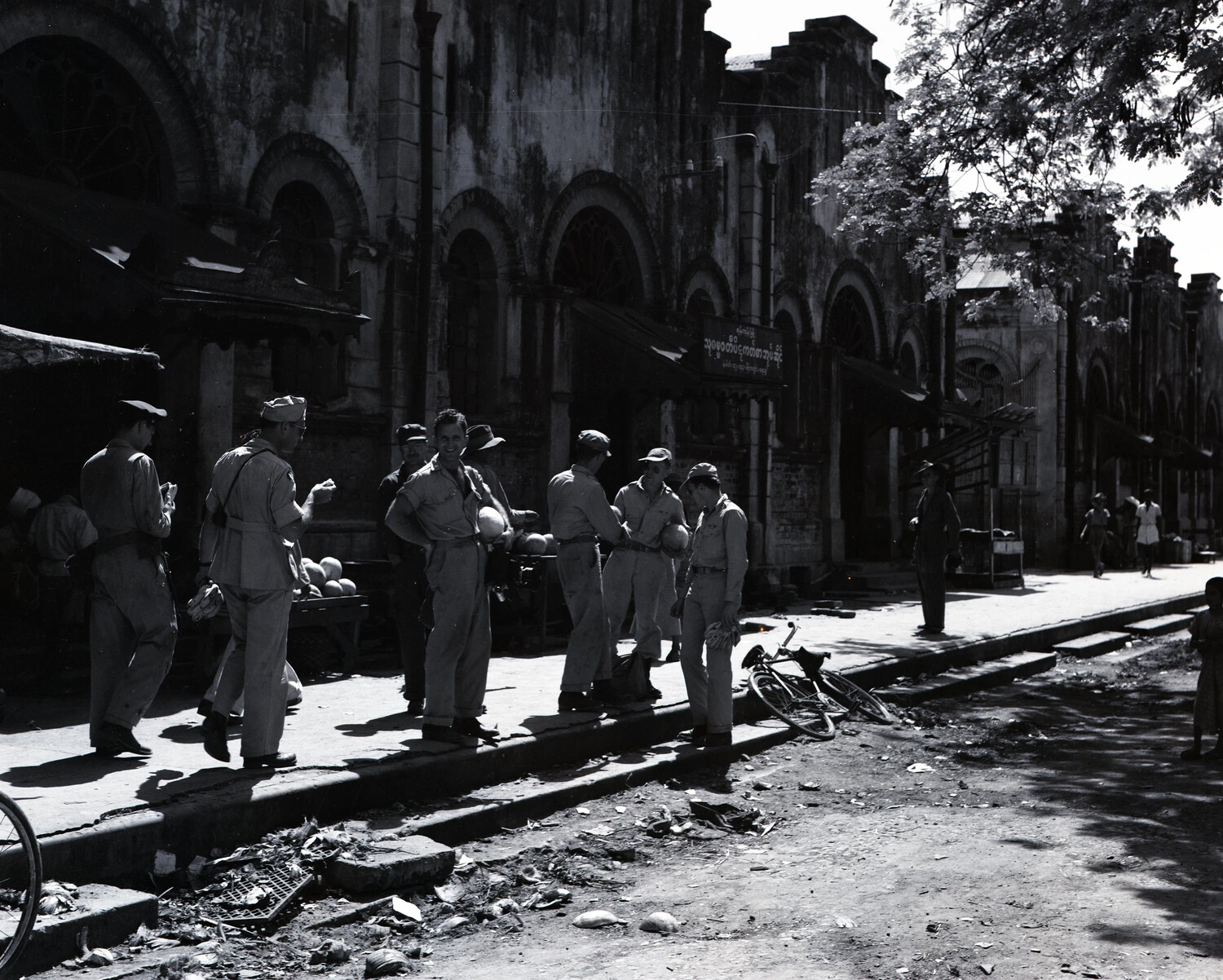American Servicemen Purchasing Fruit from a Street Vendor, Mandalay, Burma, World War II