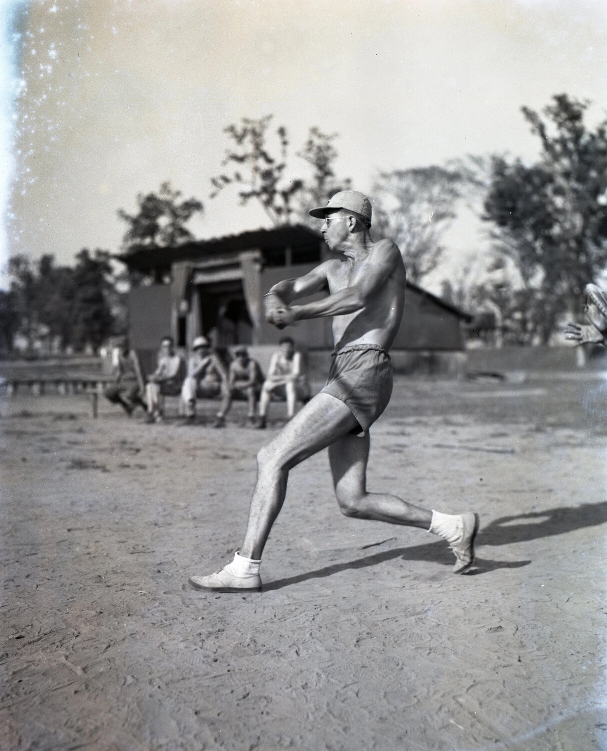 Serviceman Batting During Recreational Softball Game, CBI Theater, WWII