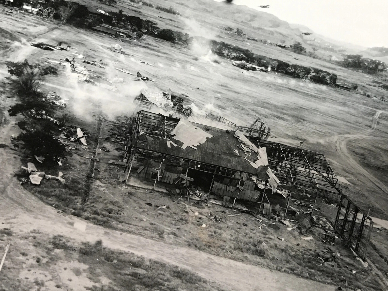 Hangar Destruction During Low-Level B-25 Strike on Japanese Airfield
