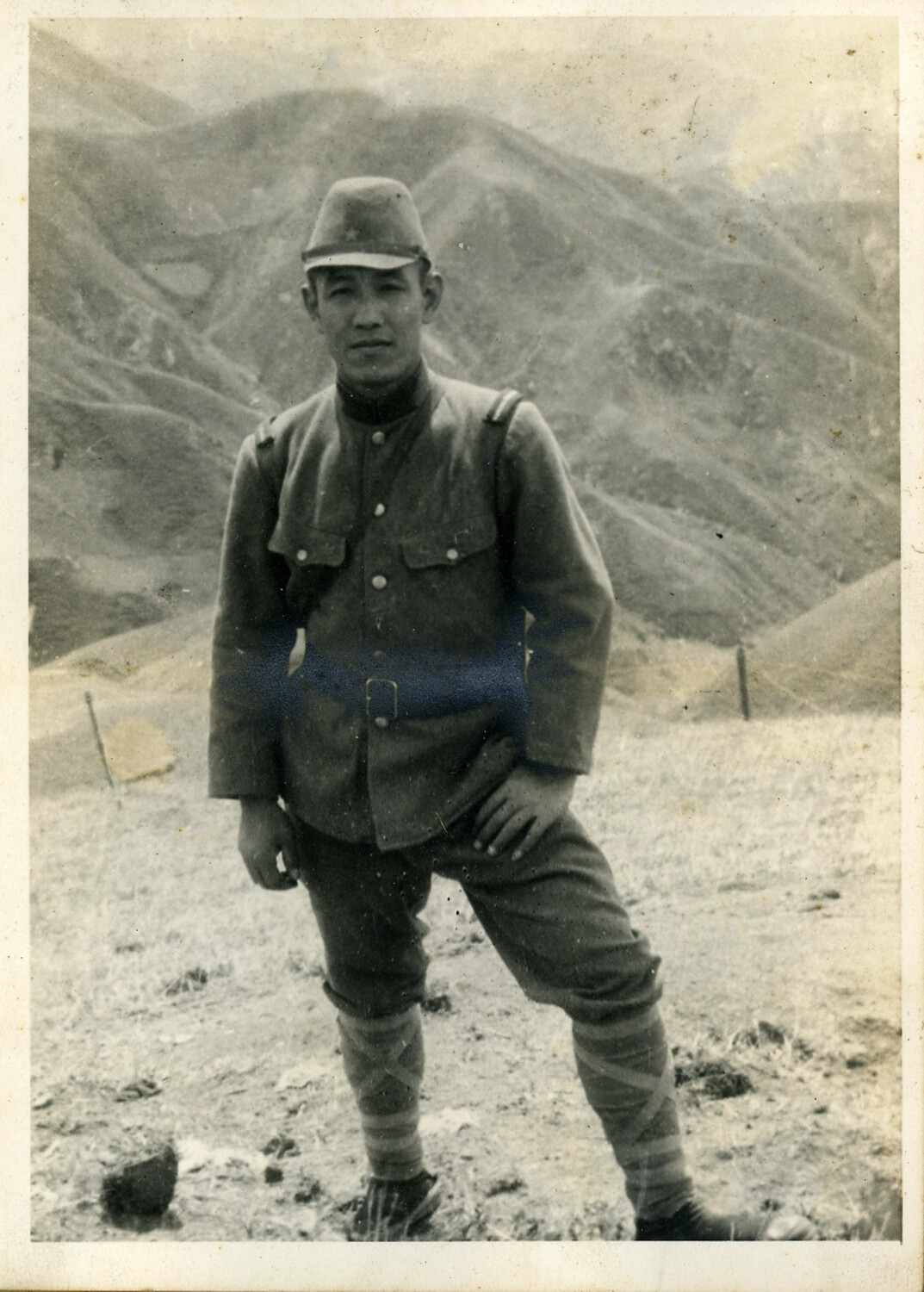 Full-Length Portrait of a Japanese Soldier in a Mountainous Field Camp