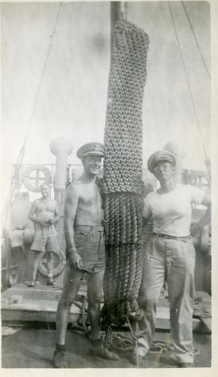 U.S. Navy Officers and Crew Beside a Rope-Wrapped Mast, Pacific Theater, World War II