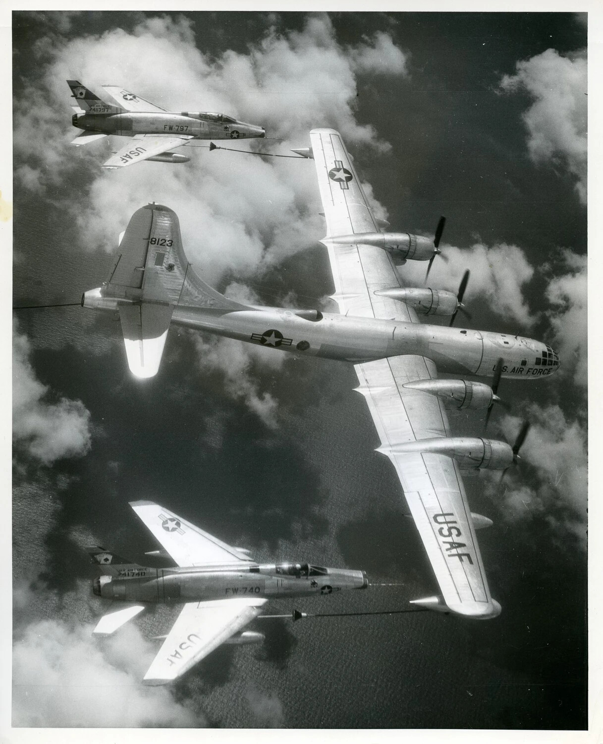 USAF Aerial Refueling Formation: Tanker Aircraft with Two F-100 Super Sabre Fighters
