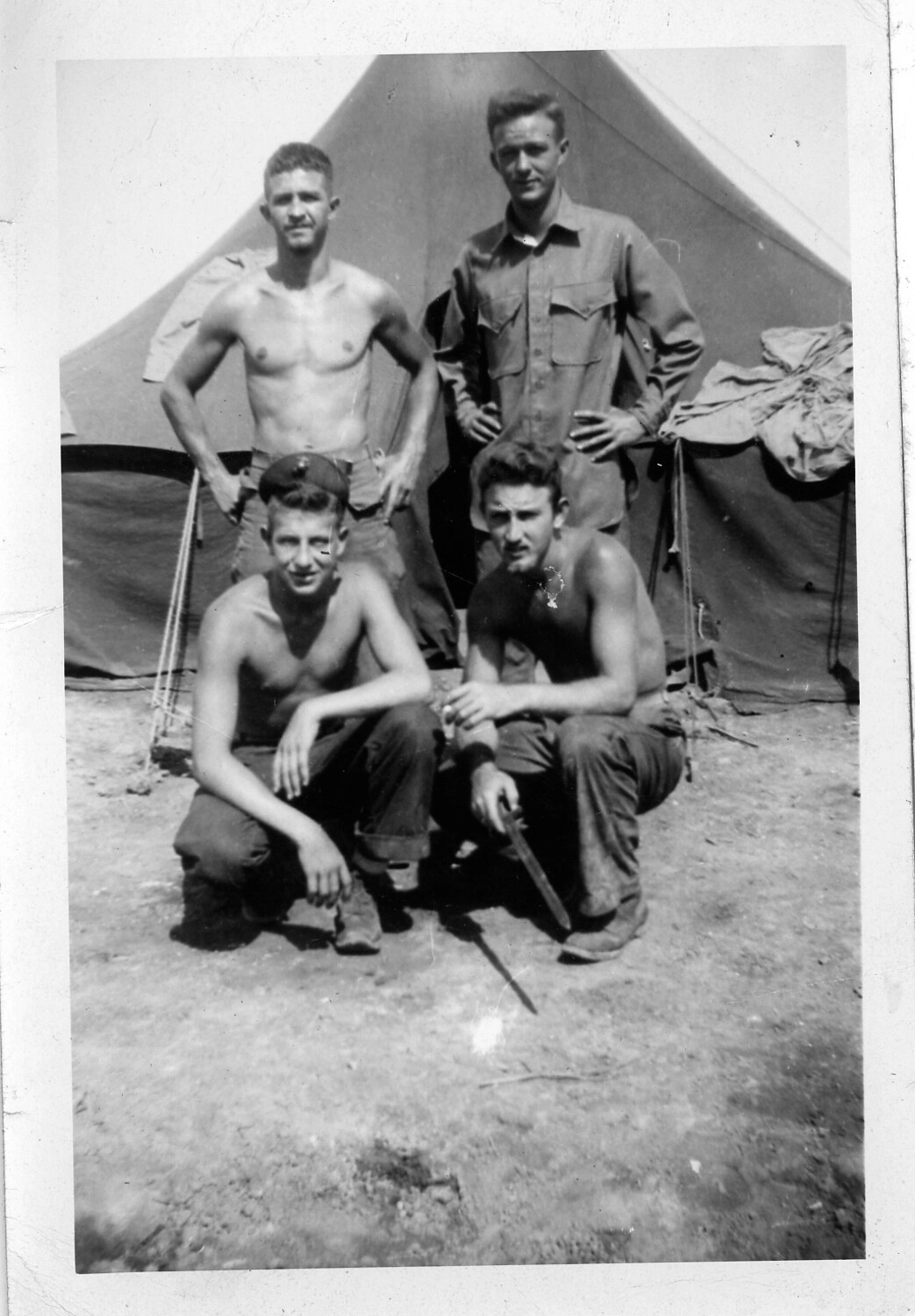 Group Portrait of Four Servicemen at a Tent Encampment