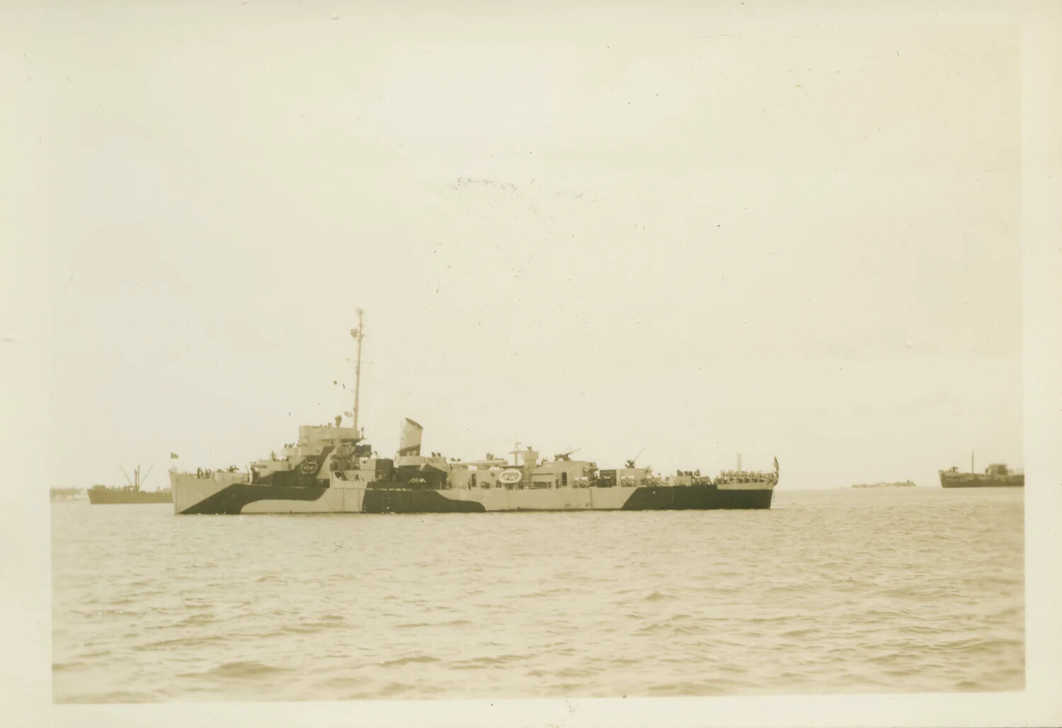 U.S. Navy Warship in Camouflage Livery at Anchor, Leyte Gulf Invasion Fleet, 1944