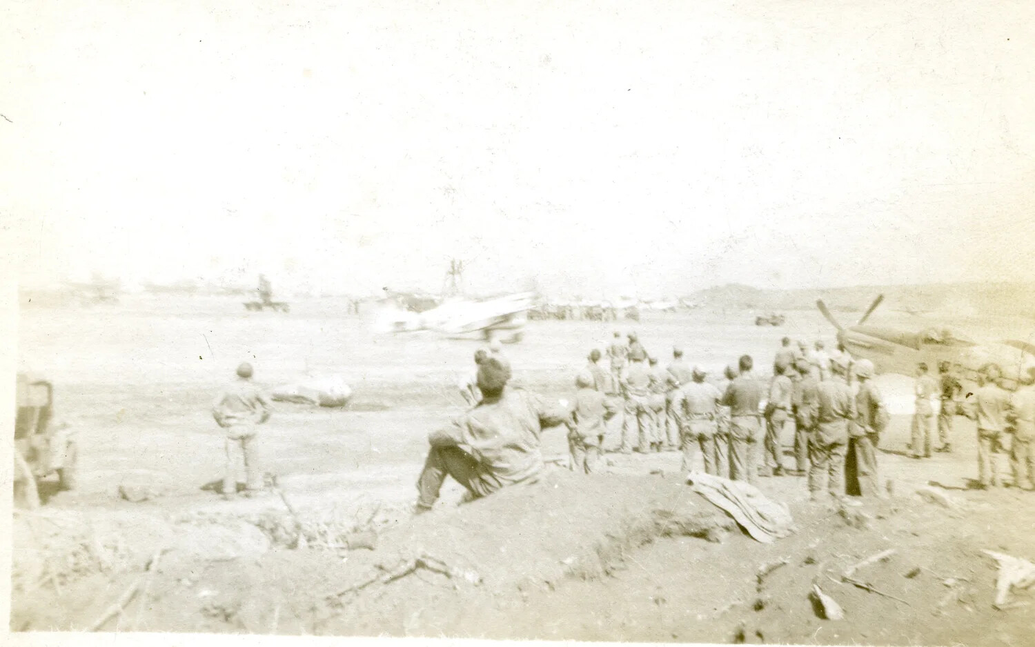Marines Observing Aircraft on Airfield, Iwo Jima, 1945 (5th Marine Division)