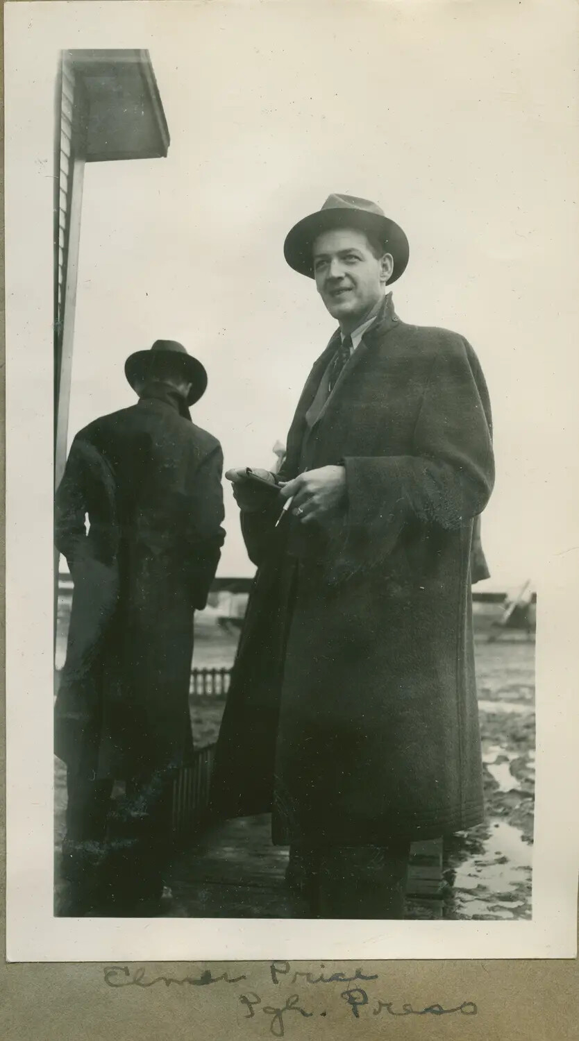 Press Photographer Elmer Price of the Pittsburgh Press at a Naval Air Station Waterfront, WWII Era