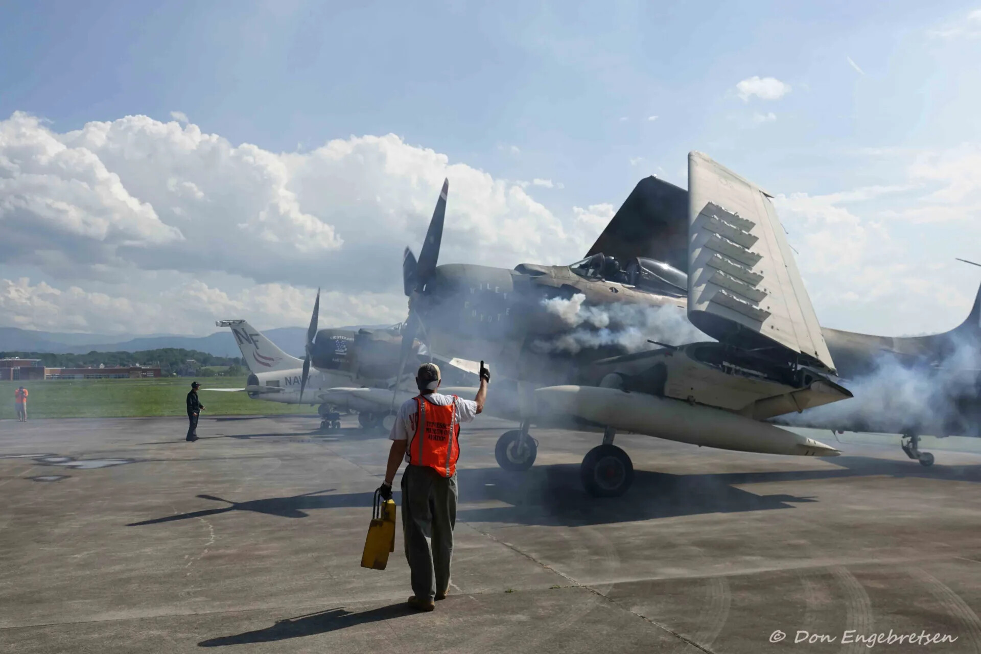 Ground Crew Marshals an A-1 Skyraider During Engine Start, Tennessee Museum of Aviation Event, May 2019