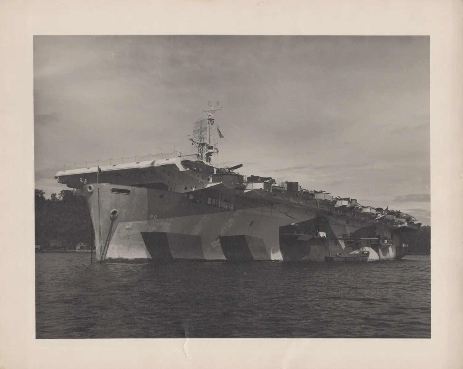 USS Petrof Bay (CVE-80) at Anchor, Bow View Showing Dazzle Camouflage, WWII