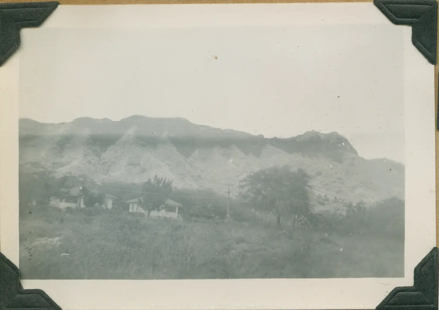 Eroded Volcanic Ridge with Houses in Foreground, Oahu, Hawaii, WWII Era