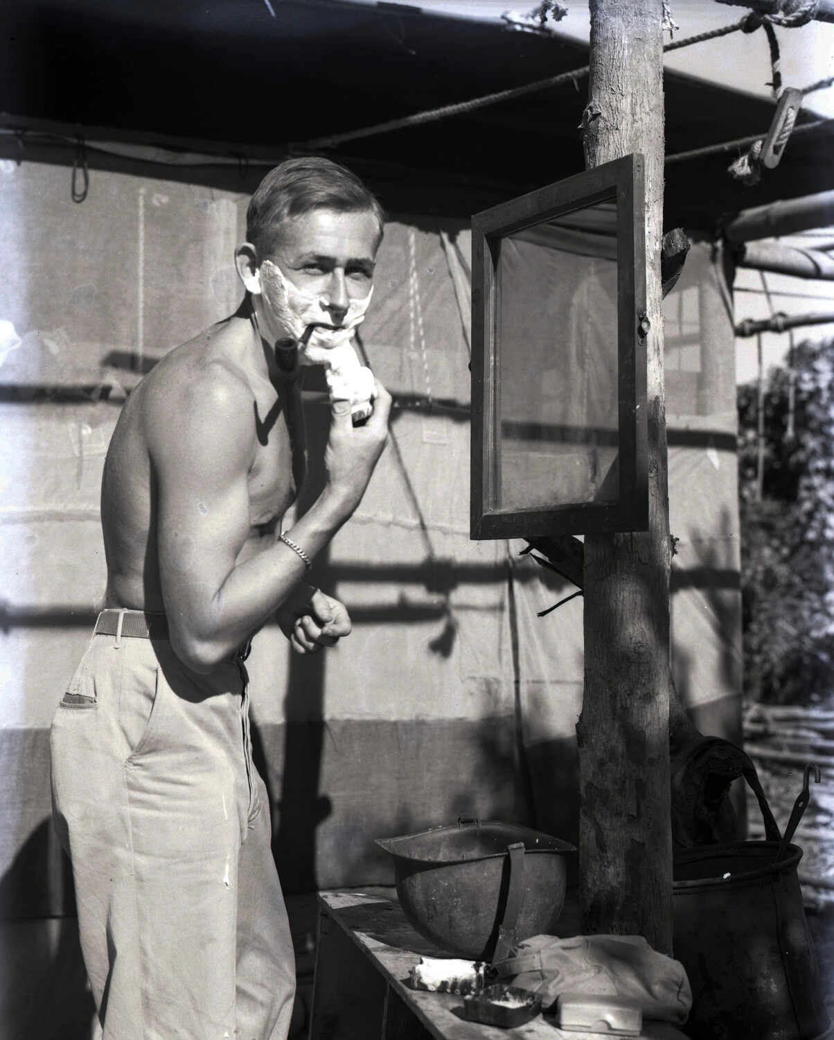Serviceman Shaving Outdoors at Field Camp, CBI Theater - Myitkyina, Burma, WWII