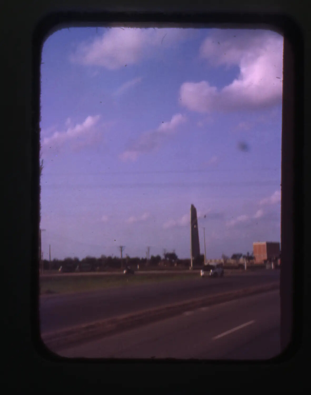 Roadside View with Tower Structure, Possibly Cam Ranh Bay, Vietnam