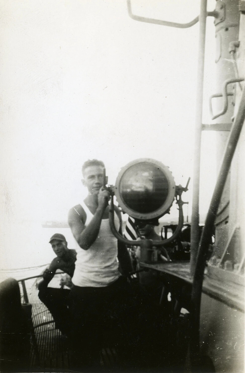 Sailor Operating Signal Searchlight on Submarine Deck, USS Charr (SS-328) Collection