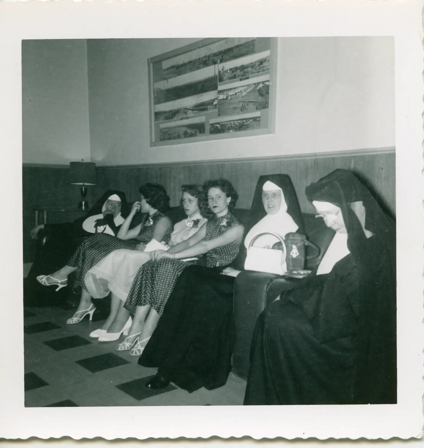 Group Portrait of Women and Nuns Seated on a Couch, Indoor Social Gathering