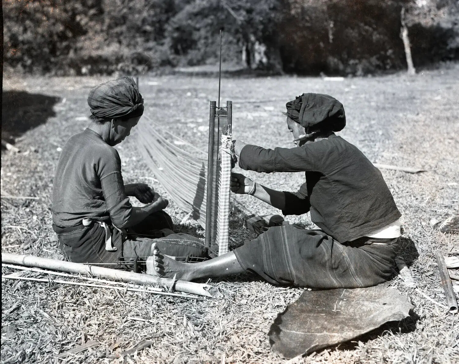 Burmese Women Weaving on a Traditional Backstrap Loom, CBI Theater, World War II Era