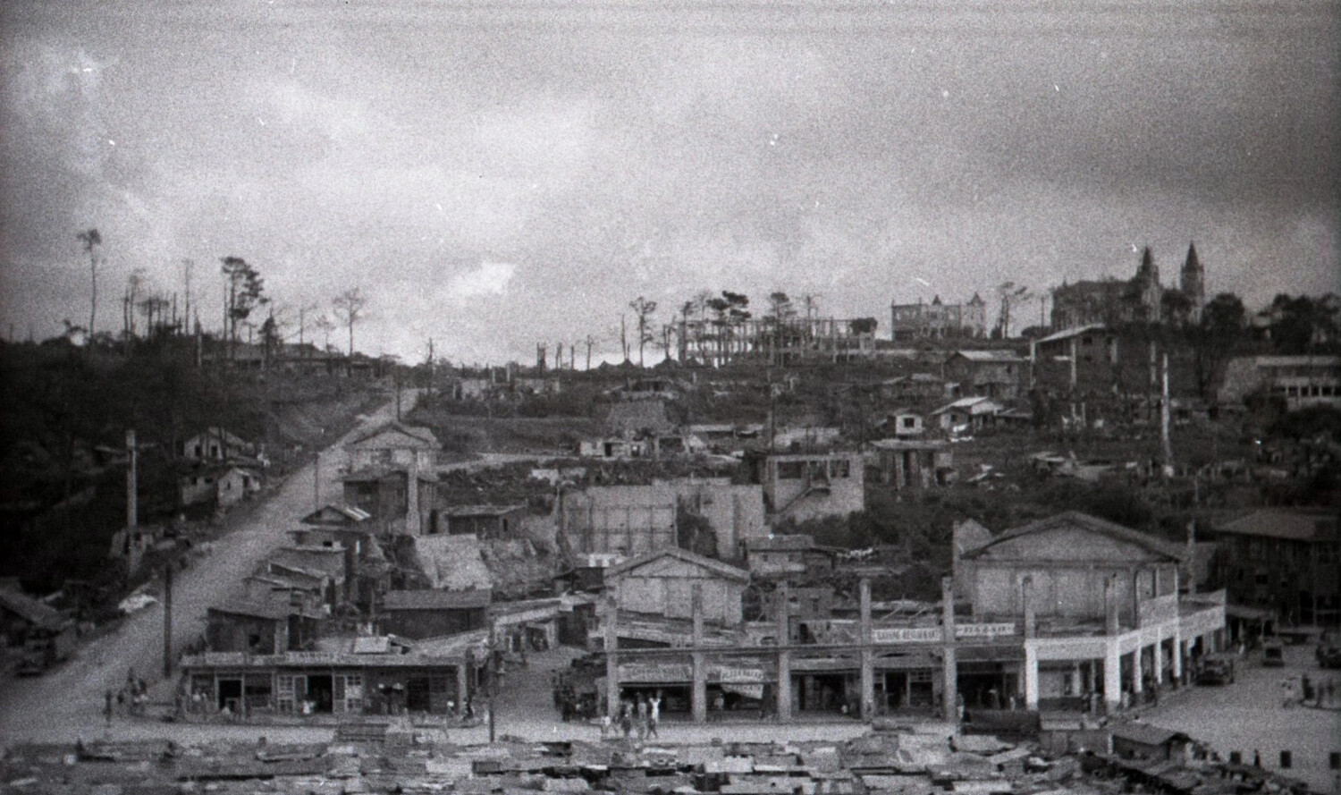 Panoramic View of War-Ravaged Filipino Town with Rebuilt Storefronts, Luzon, Philippines, WWII