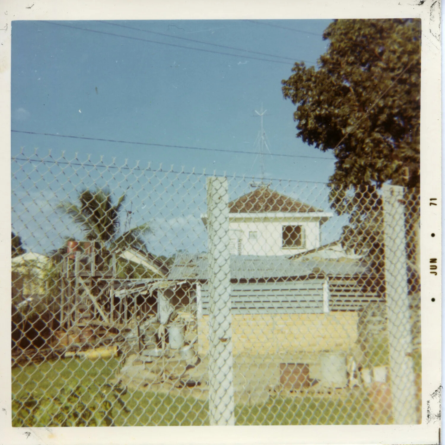 Compound View Through Perimeter Fence with Two-Story Building, Vung Tau/Saigon Area, South Vietnam, June 1971