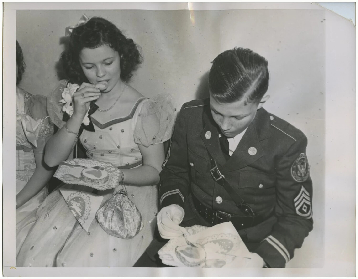 Shirley Temple with Escort Cadet Sergeant Thomas Spear at California Military Academy Cotillion, February 19, 1941