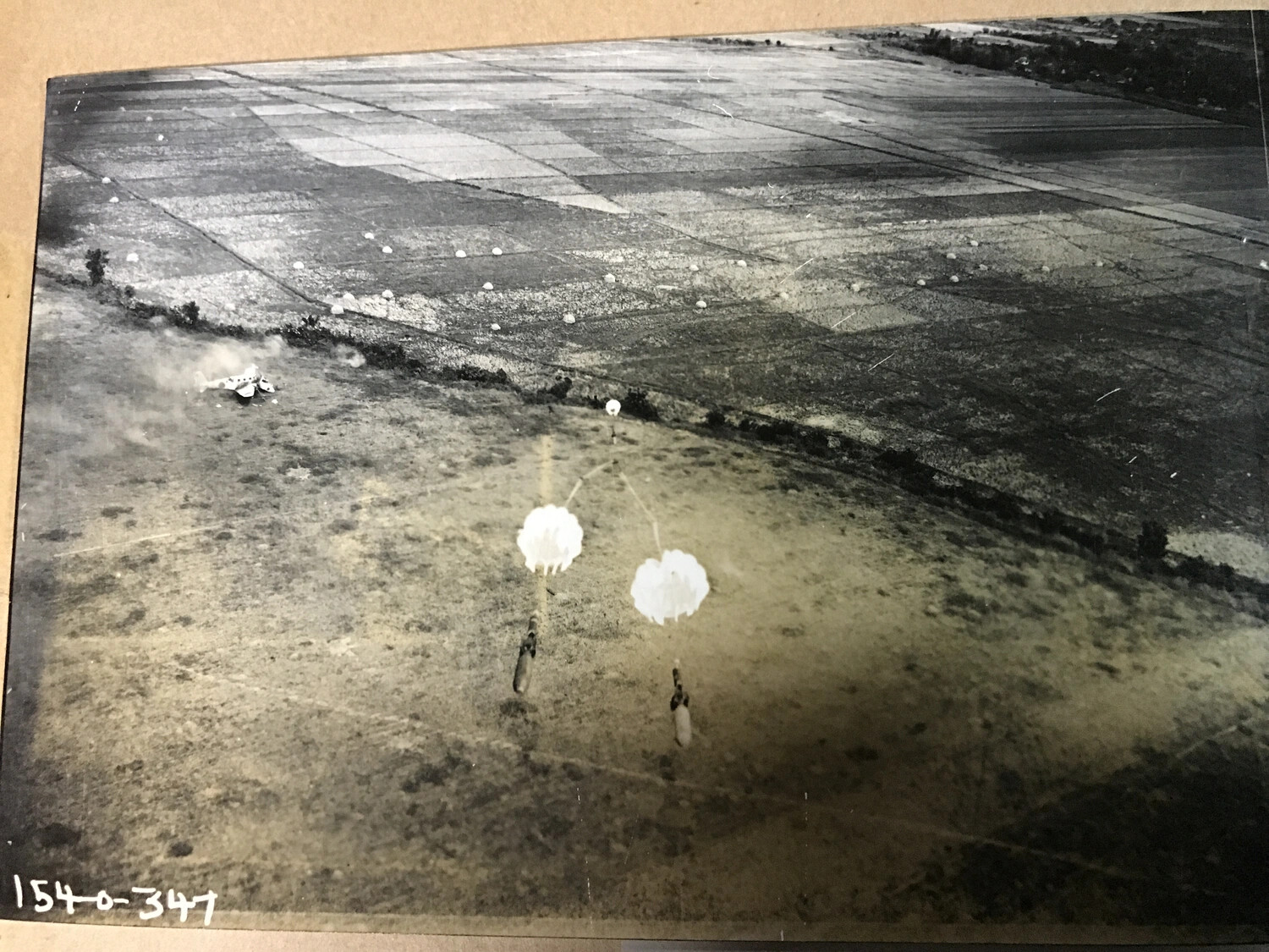 Parafrag Bombing Attack on Japanese Airfield with Aircraft Destroyed on Ground