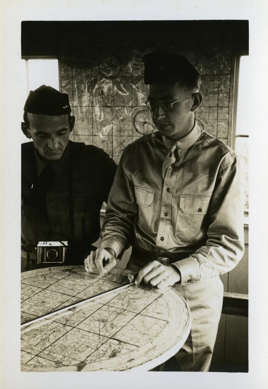 Servicemen Reviewing a Grid Map, China-Burma-India Theater, WWII