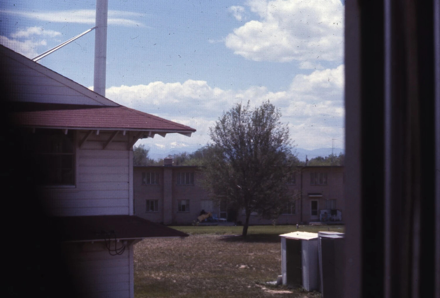View of Military Base Barracks and Mountain Range from Window, Vietnam War Era