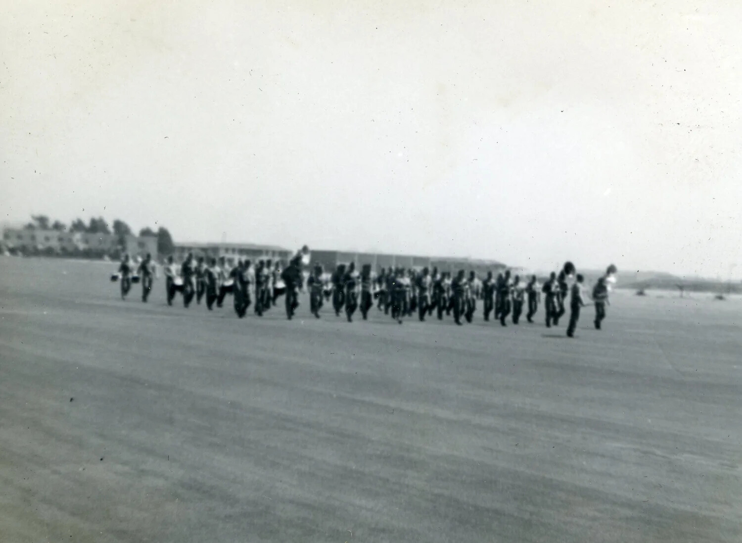 Marines Double-Timing in Formation on Airfield Apron, VMF-214 Album, 1945