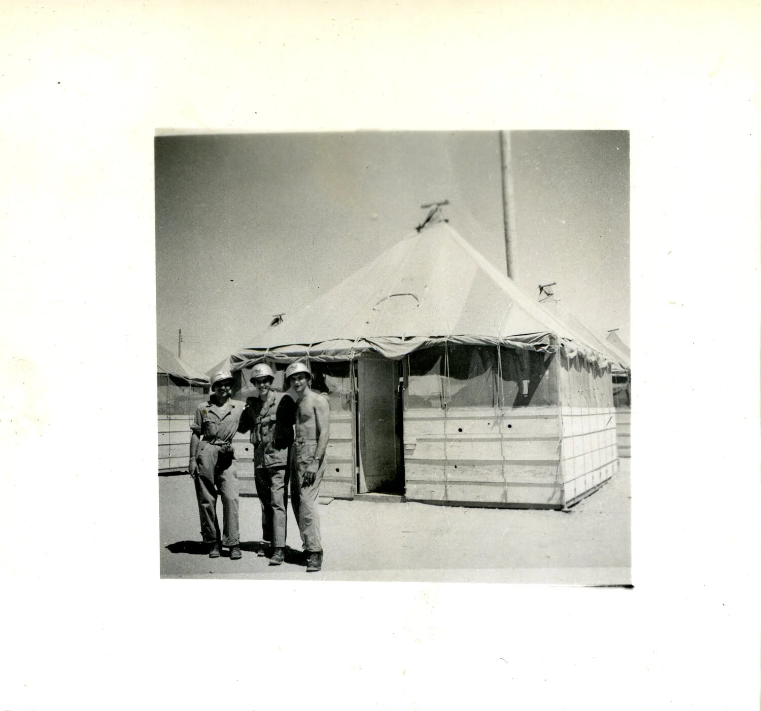 Airmen Outside a Tent-and-Plywood Hut, Pacific Island Airbase — WWII