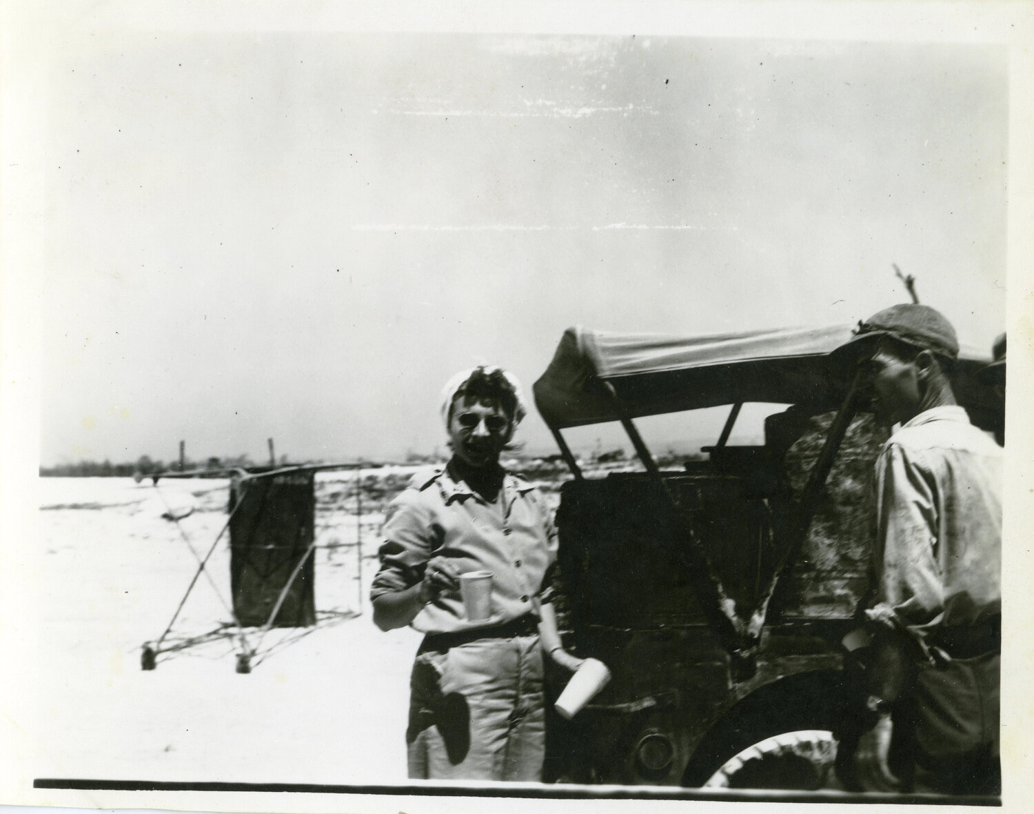 Japanese Delegation Member with American Serviceman Beside Vehicle, Ie Shima, August 1945