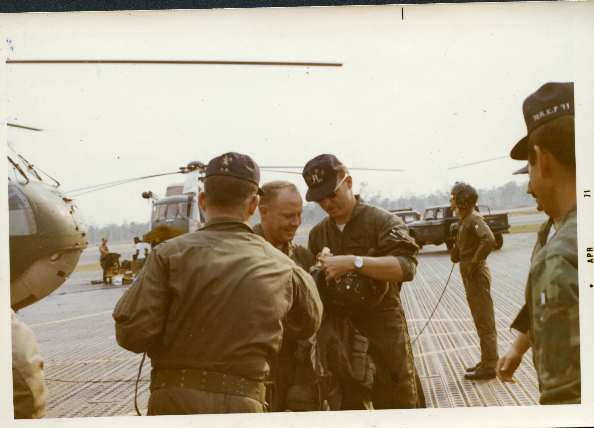 USAF Helicopter Aircrew on Flight Line, Southeast Asia, April 1971
