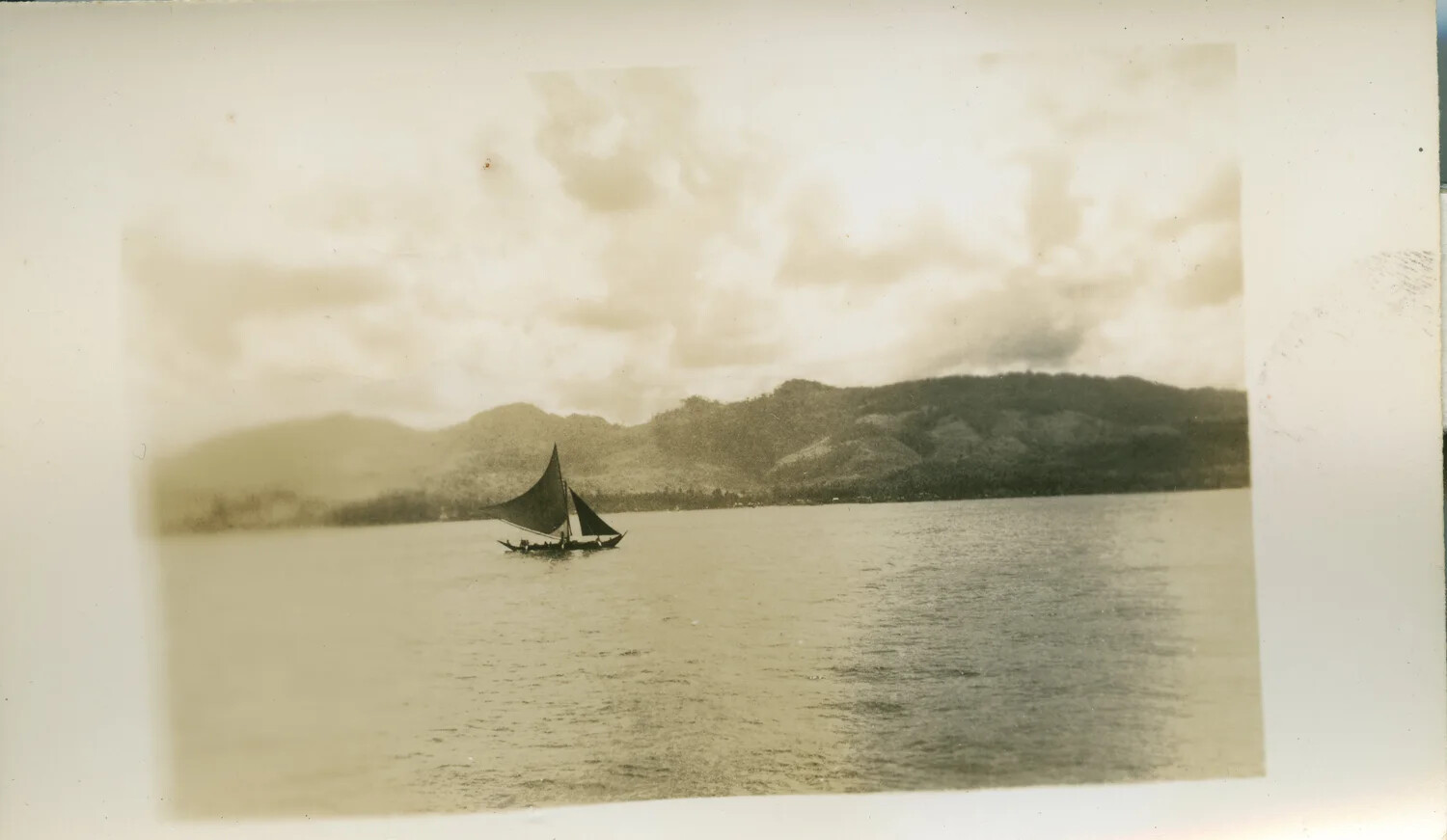 Native Outrigger Sailboat on a Philippine Bay, WWII Pacific Theater