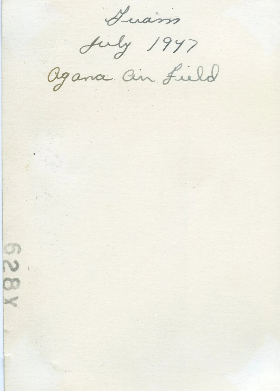 Reverse of Snapshot Print, Handwritten Caption 'Guam, July 1947, Agana Air Field'
