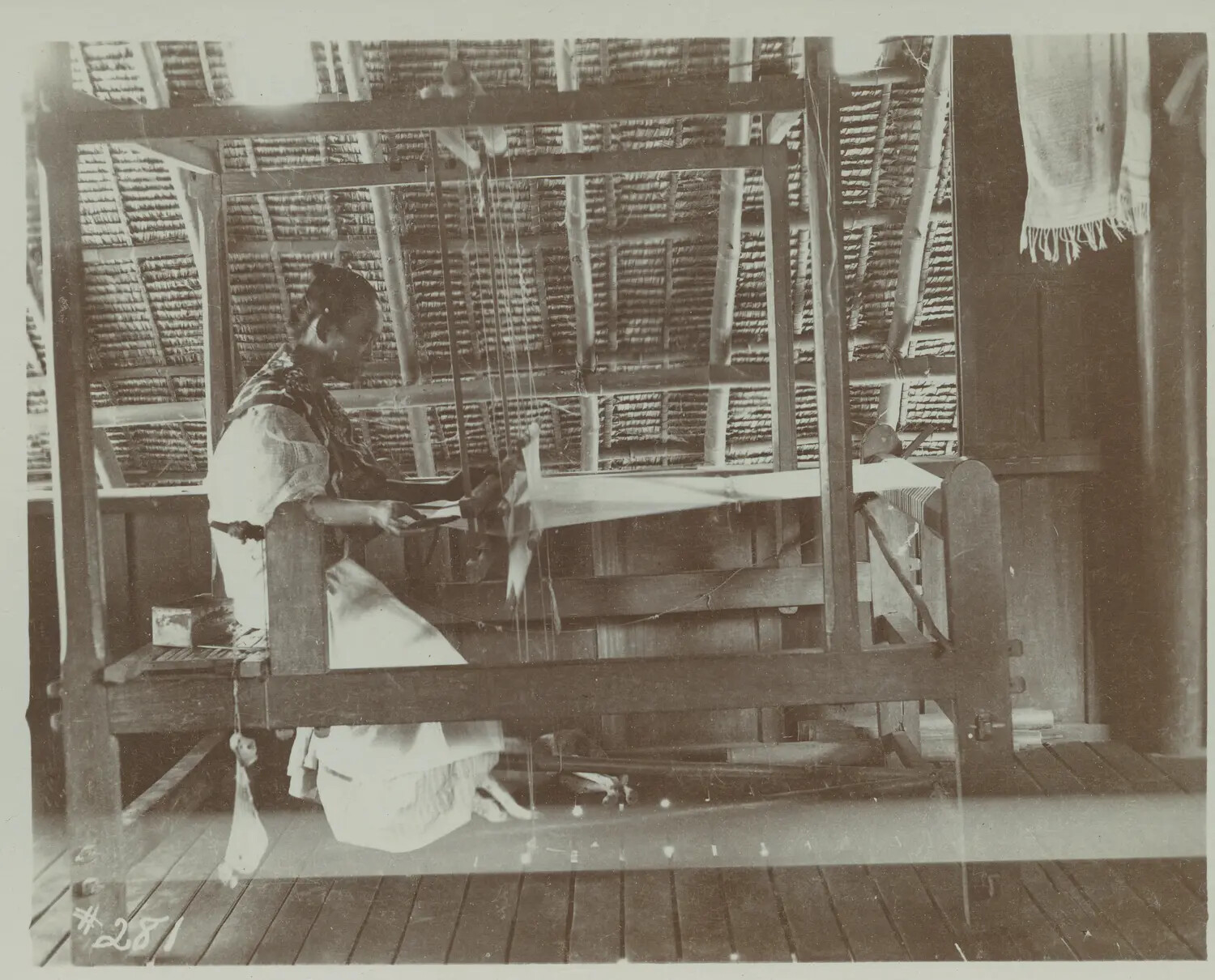 Woman Weaving Cloth on a Traditional Loom, Philippines, c. 1898-1900