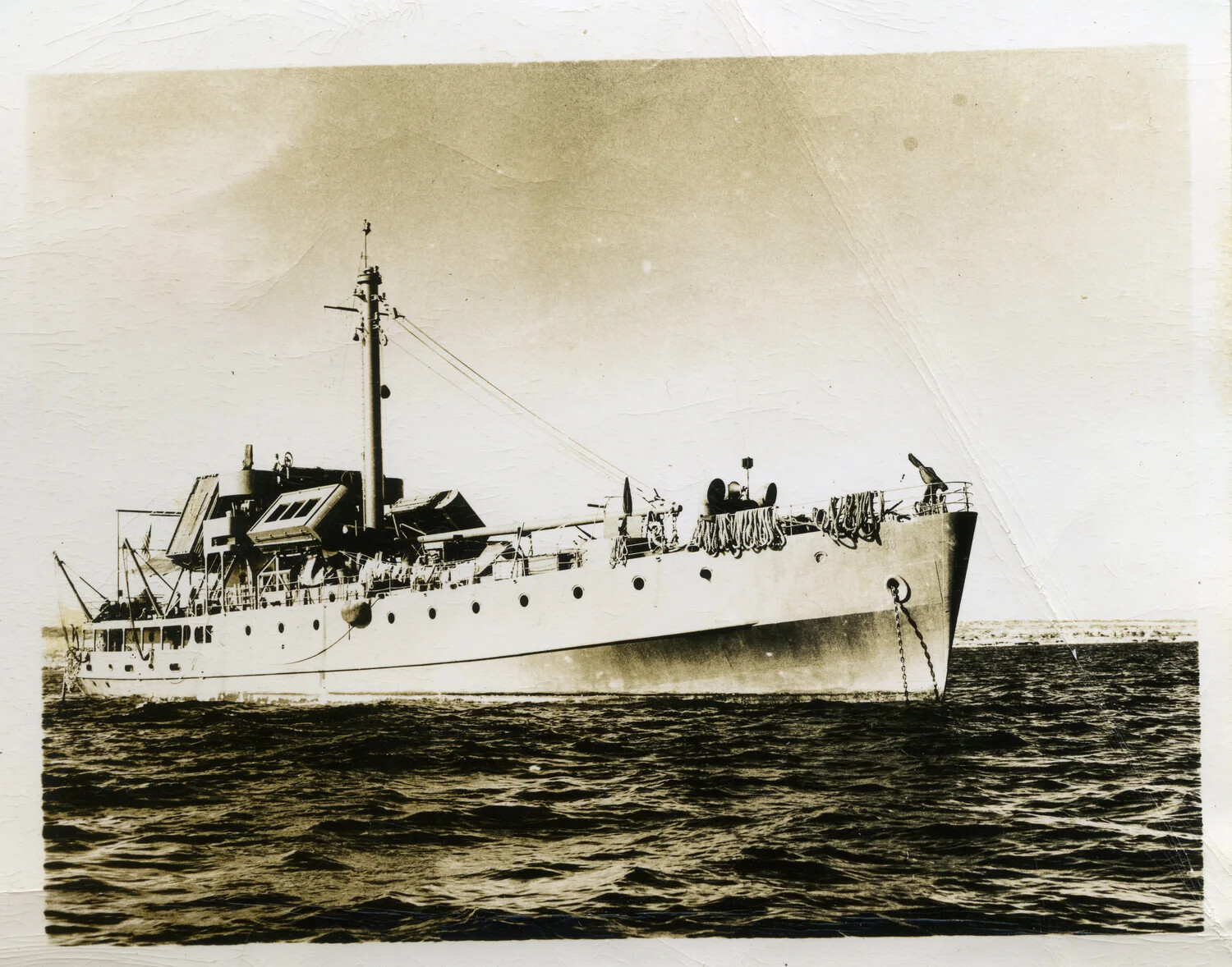 U.S. Navy Auxiliary or Transport Vessel at Anchor, Close View, Pacific Theater, WWII