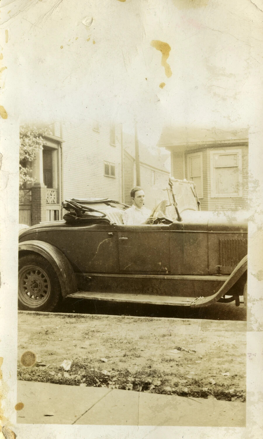Young Man in Convertible Touring Car, Residential Street (Pre-War Family Snapshot, Kwajalein Album)