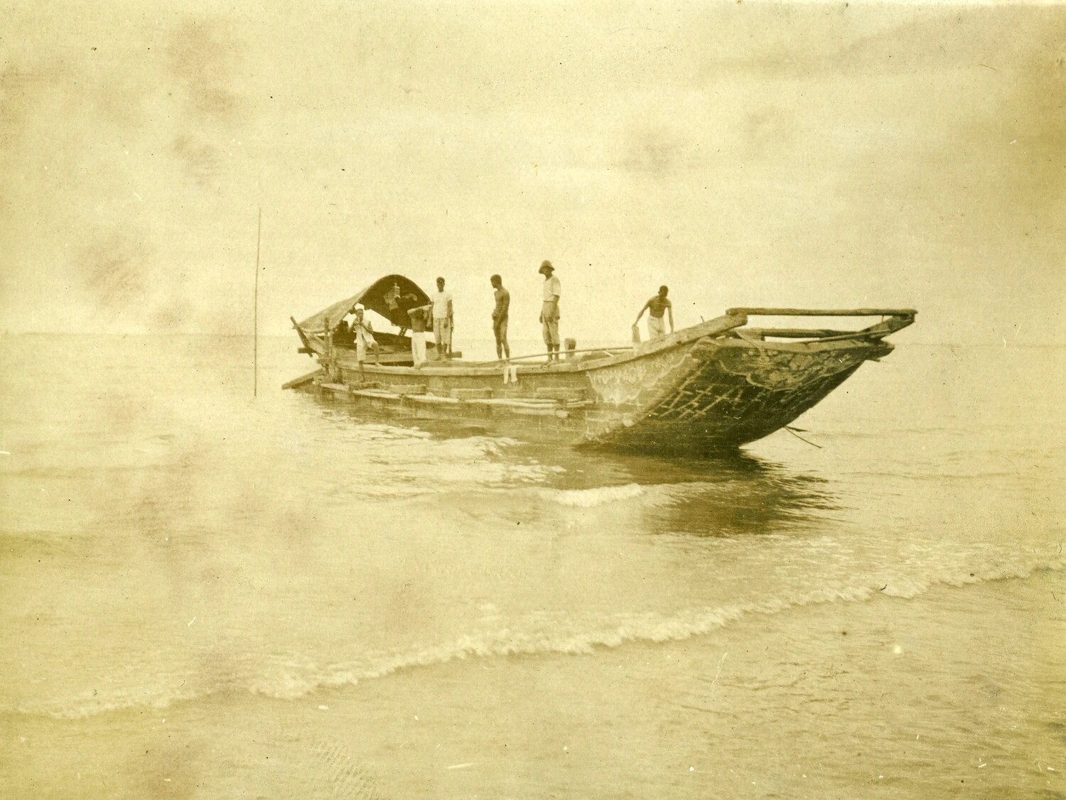 Traditional Filipino Boat with Crew Offshore, Carl Stone Philippines Album, Early 1900s