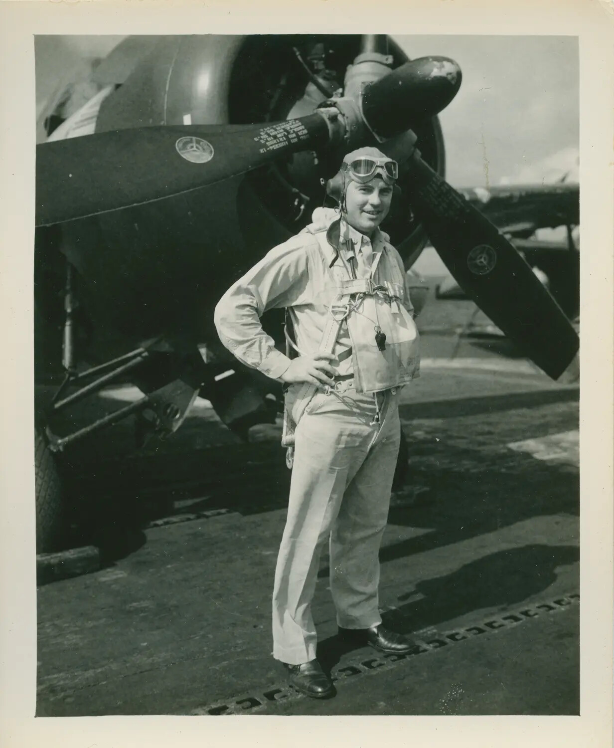 U.S. Navy Aviator Beside Carrier Aircraft Propeller, USS Petrof Bay (CVE-80), WWII