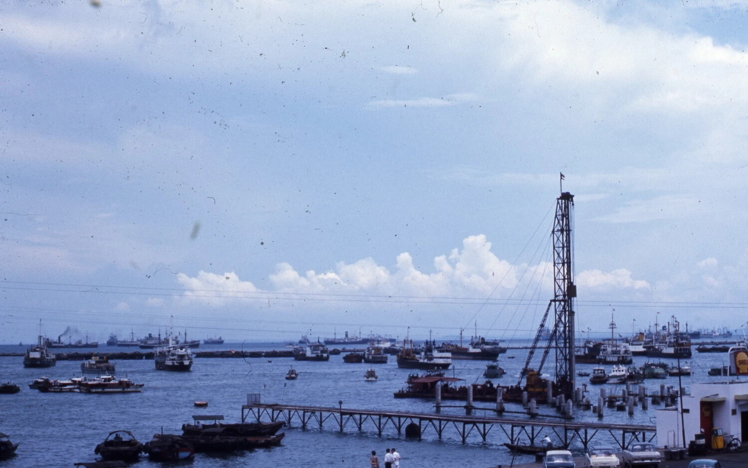 Harbor View with Cargo Vessels and Pier Derrick, Likely Far East Port Call, Vietnam War Era