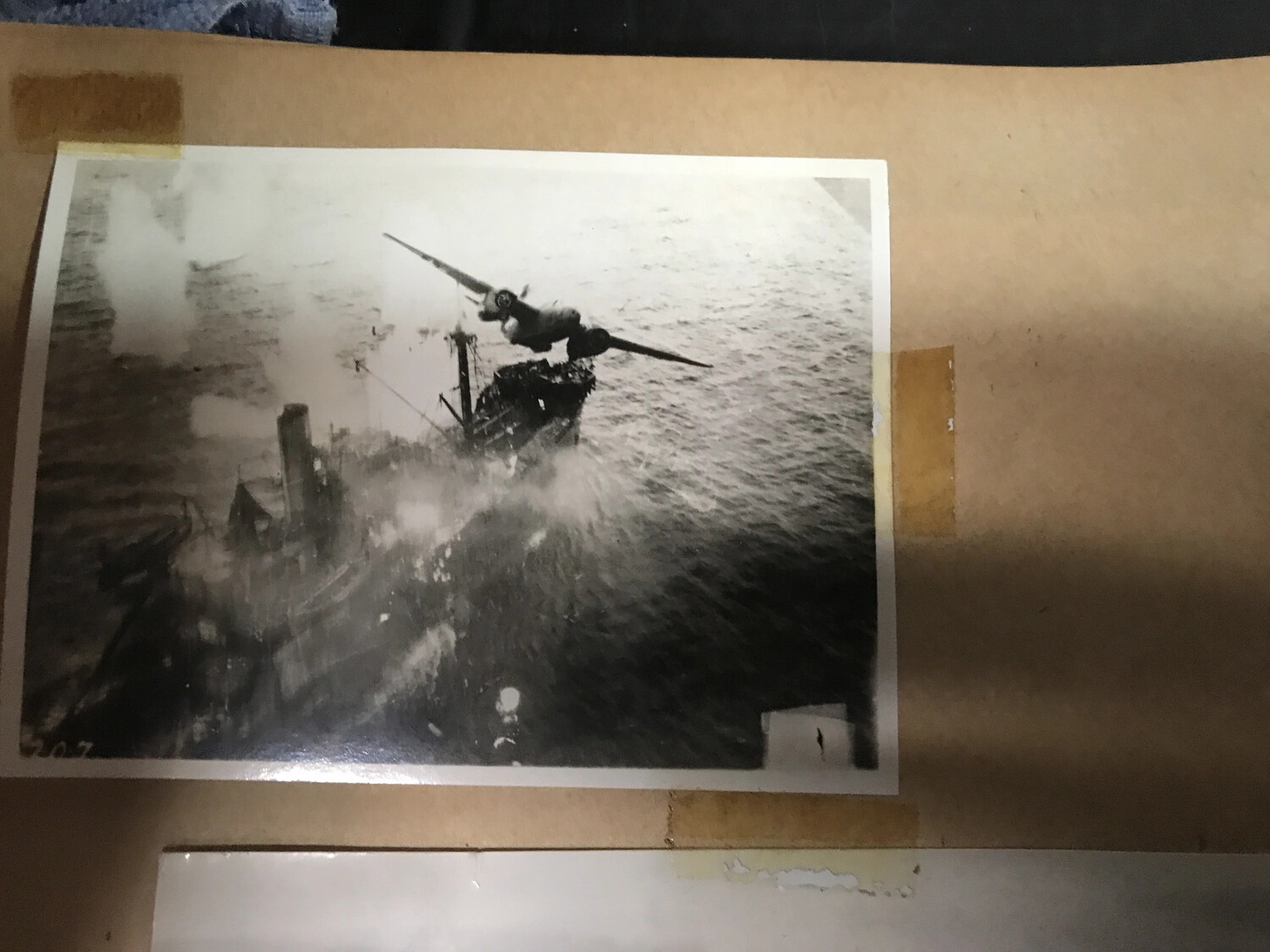 Low-Level Attack Bomber Strikes Japanese Vessel, 312th Bombardment Group Scrapbook Photo