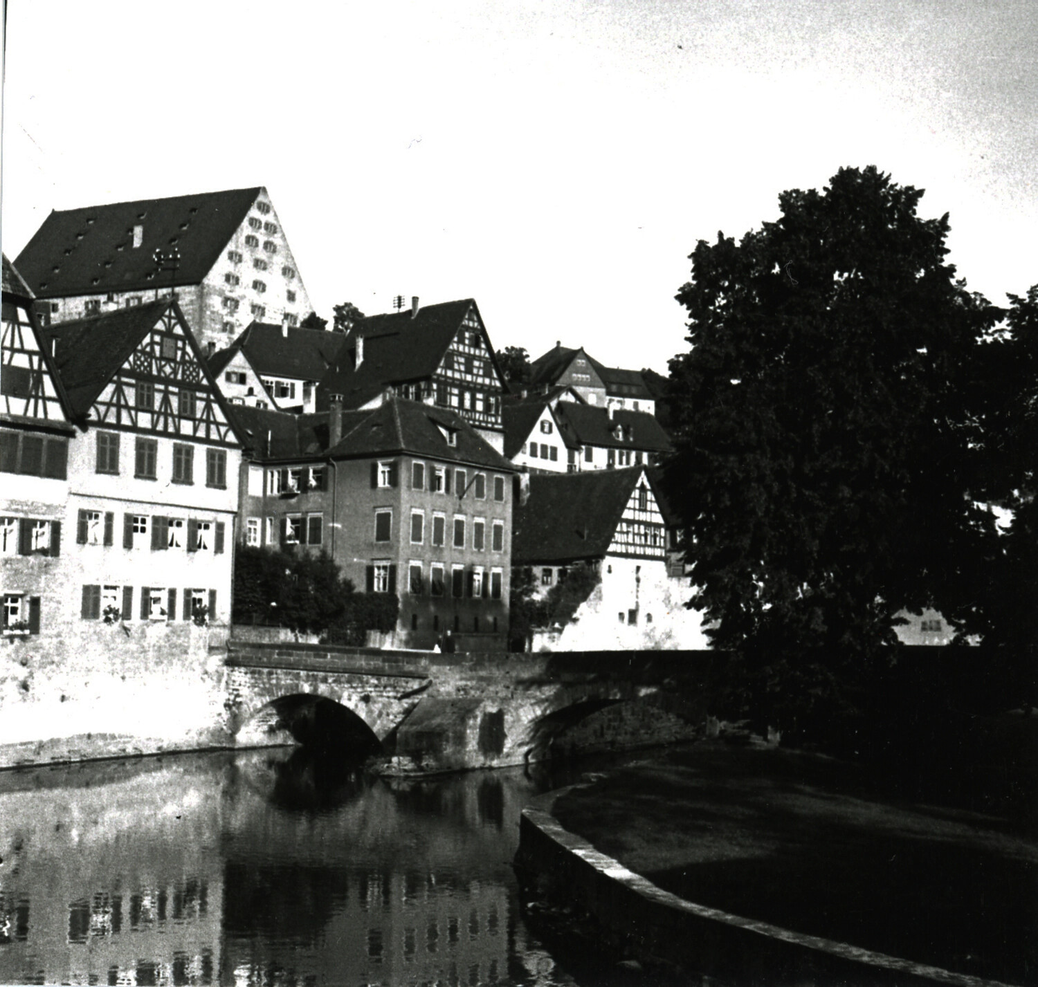 Half-Timbered German Riverside Town with Stone Bridge, Post-WWII Era
