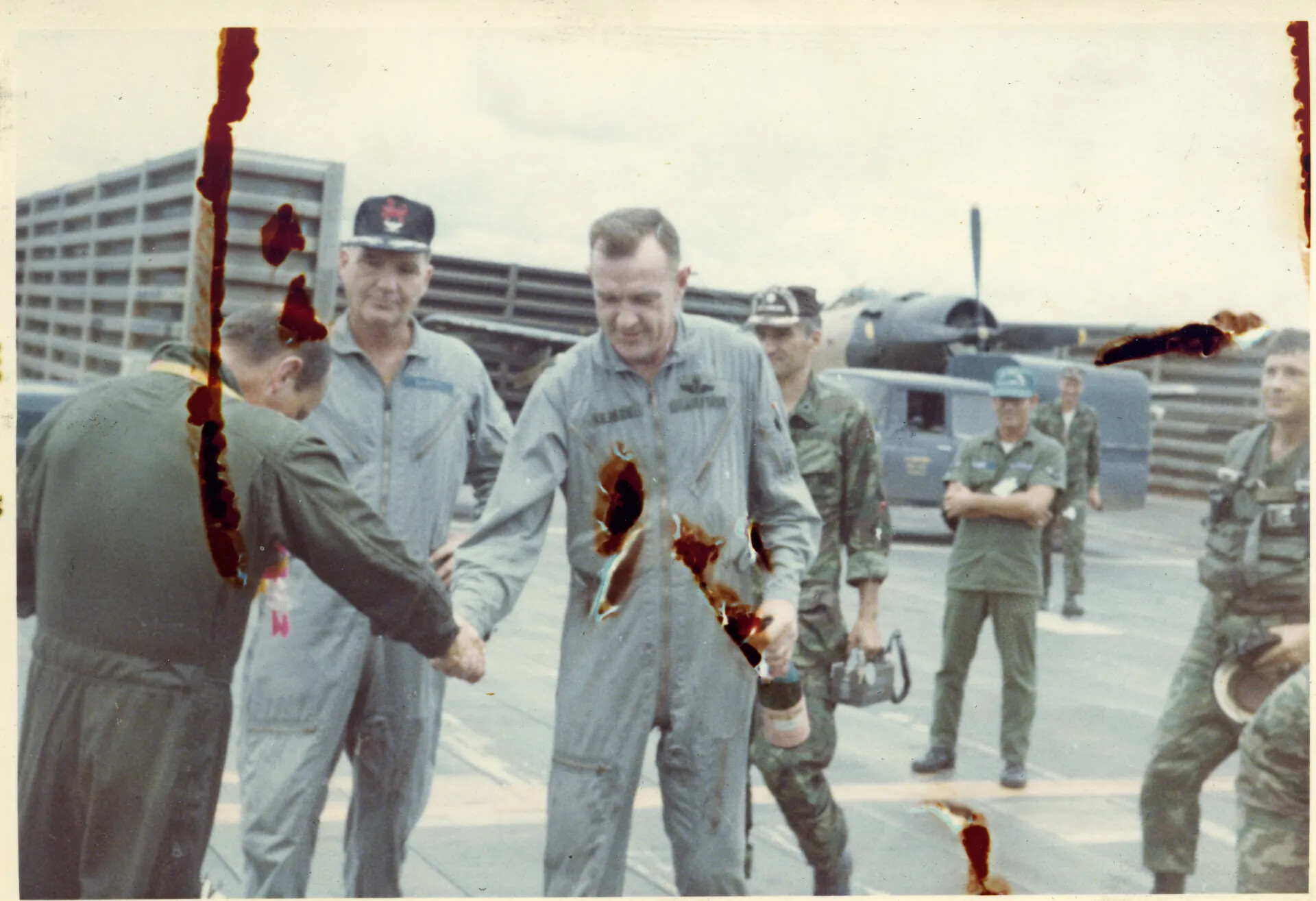 Flight Line Greeting Among Airmen, Nakhon Phanom RTAFB, Vietnam War Era (Frisch, Morris, Kilbride, Michaud)